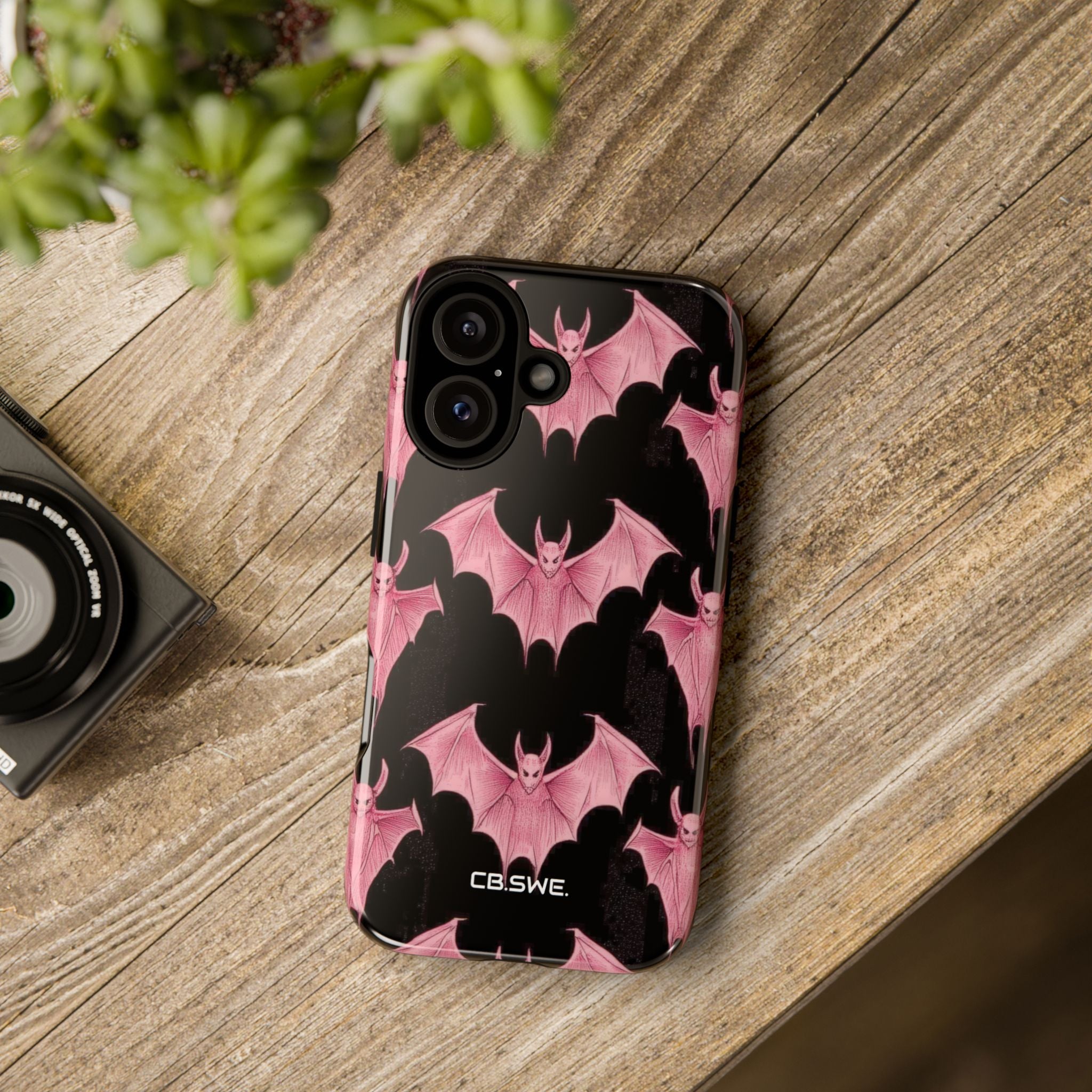 Pink Bat on Black Symmetrical iPhone 16 - Tough