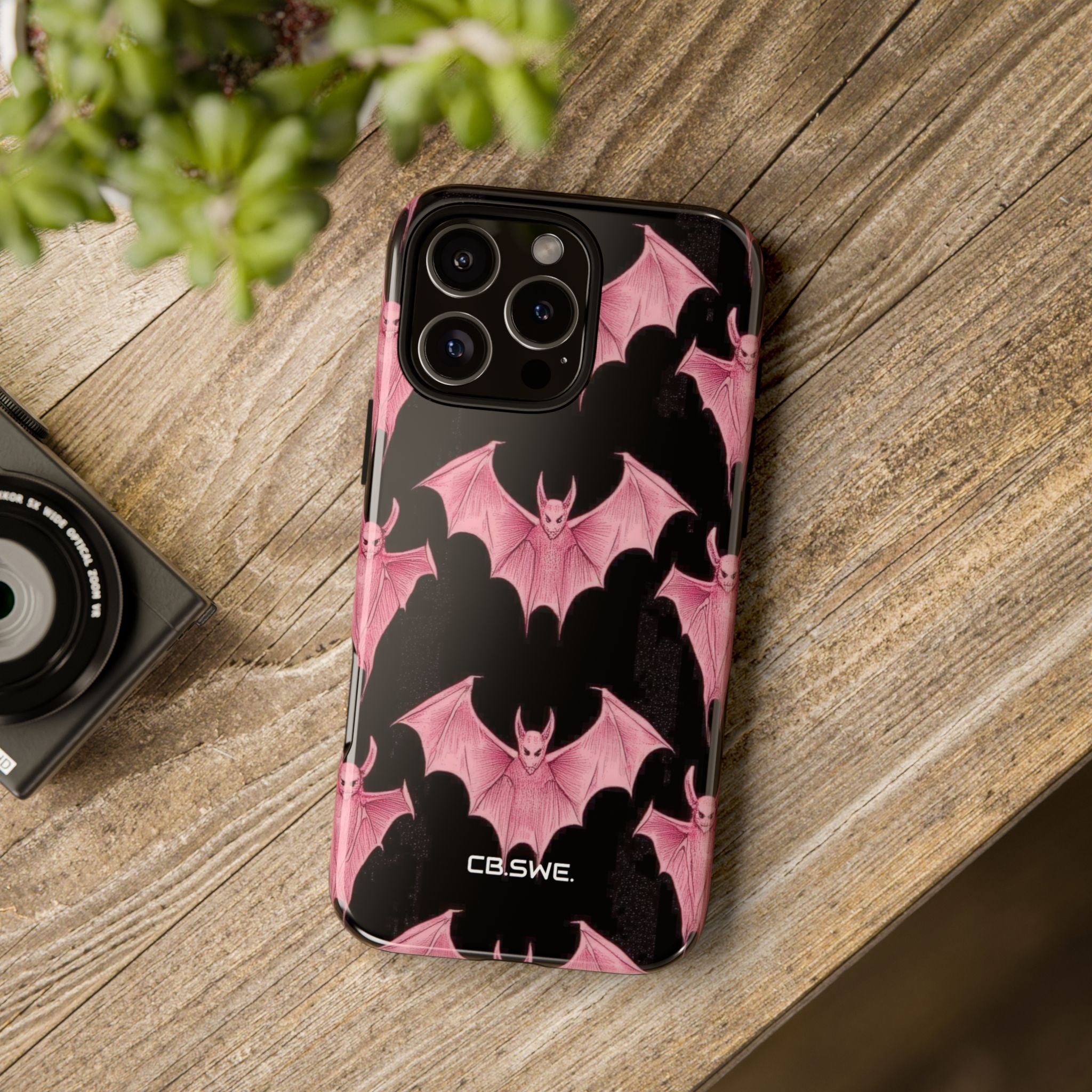 Pink Bat on Black Symmetrical iPhone 16 - Tough