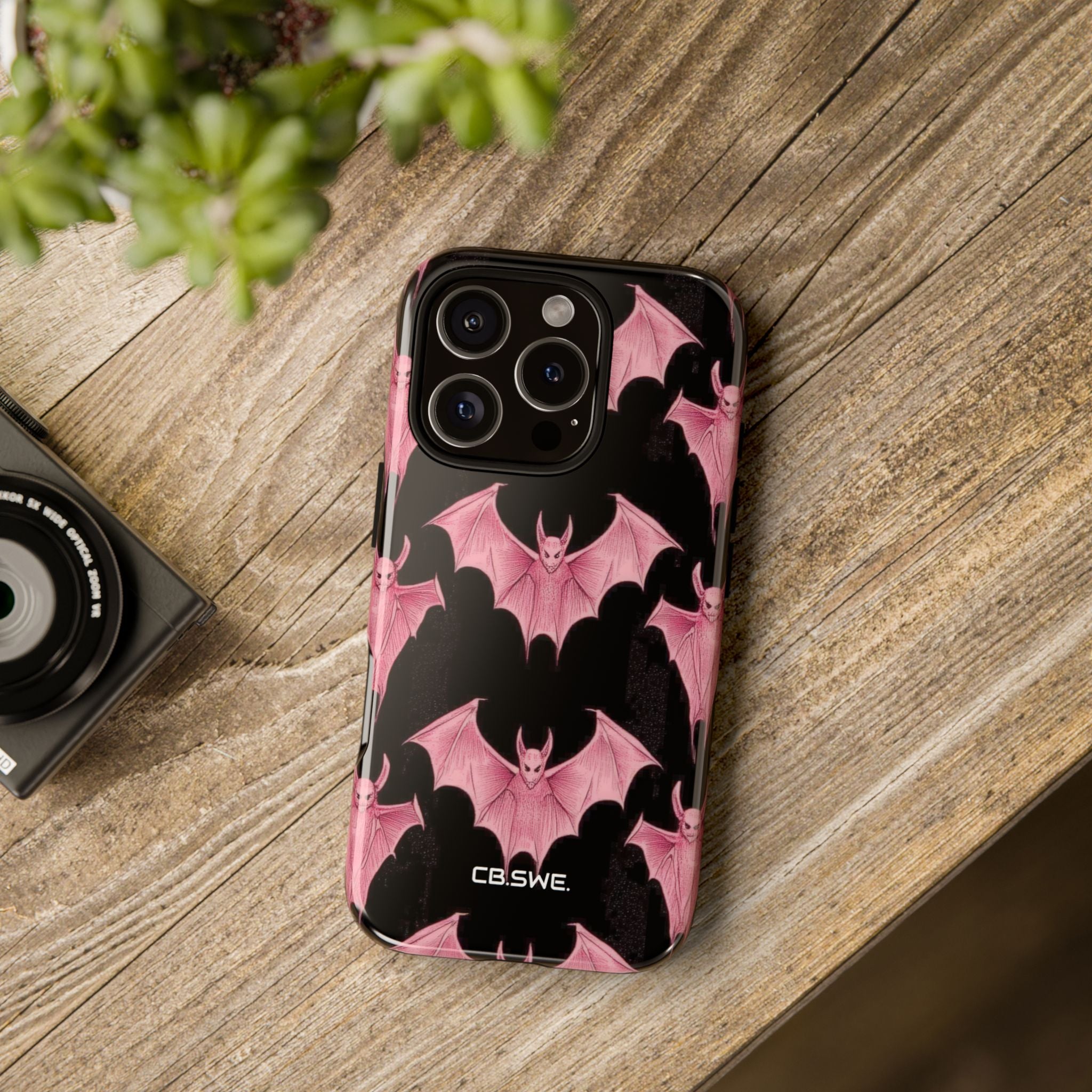 Pink Bat on Black Symmetrical iPhone 16 - Tough