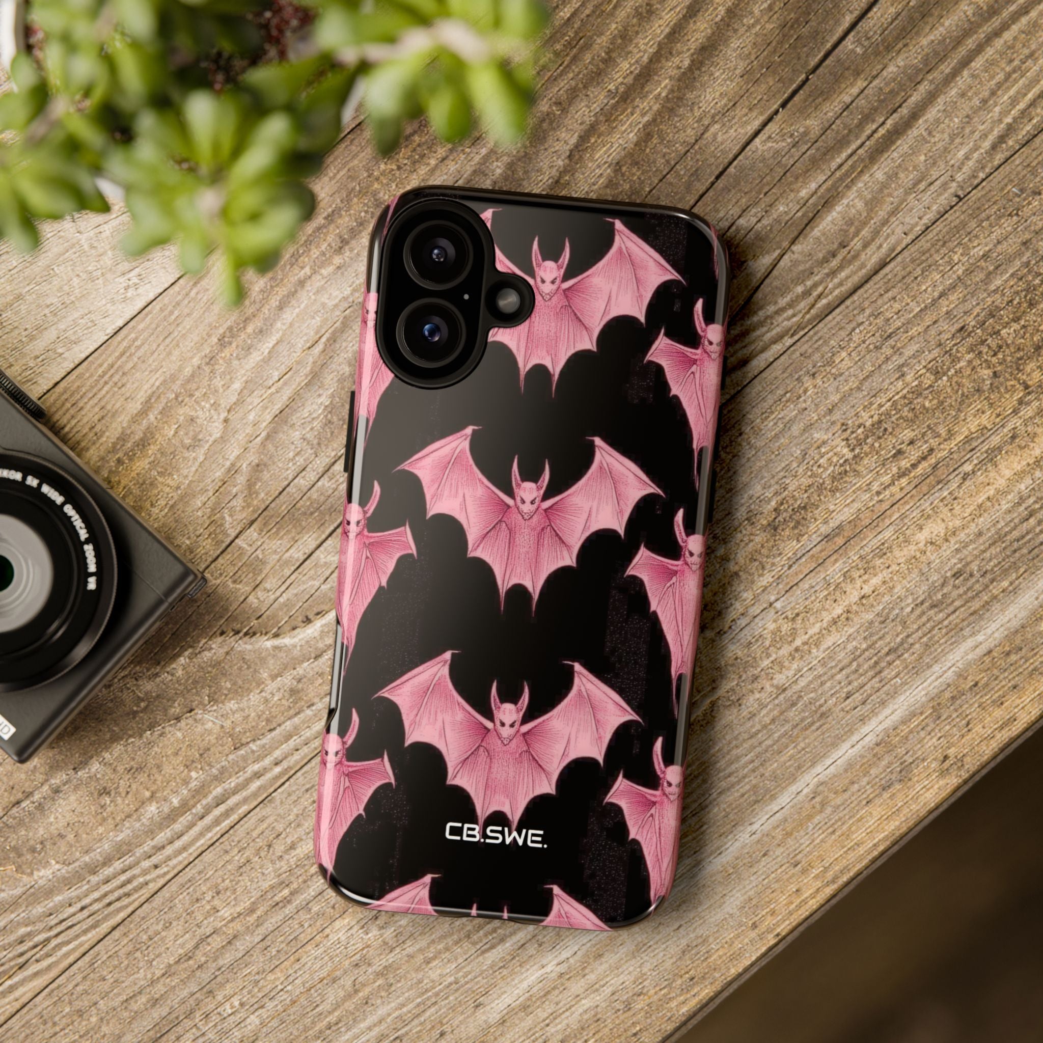Pink Bat on Black Symmetrical iPhone 16 - Tough