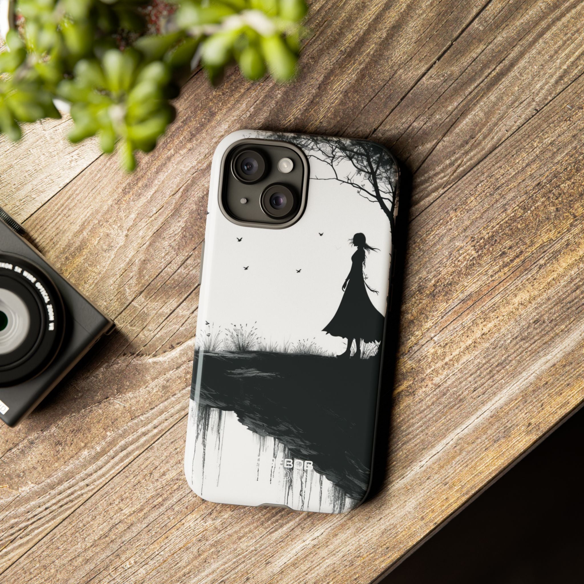 Silhouette sulla scogliera solitaria iPhone 15 - Tough