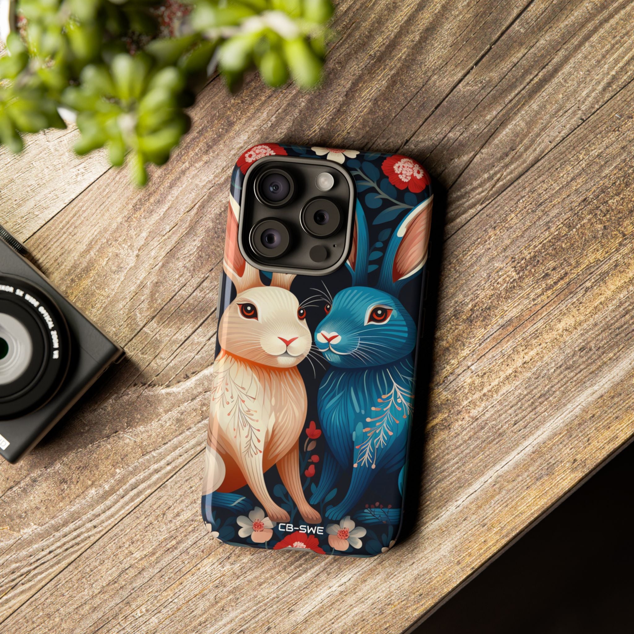 Rabbits Embrace Blossoms - iPhone Case