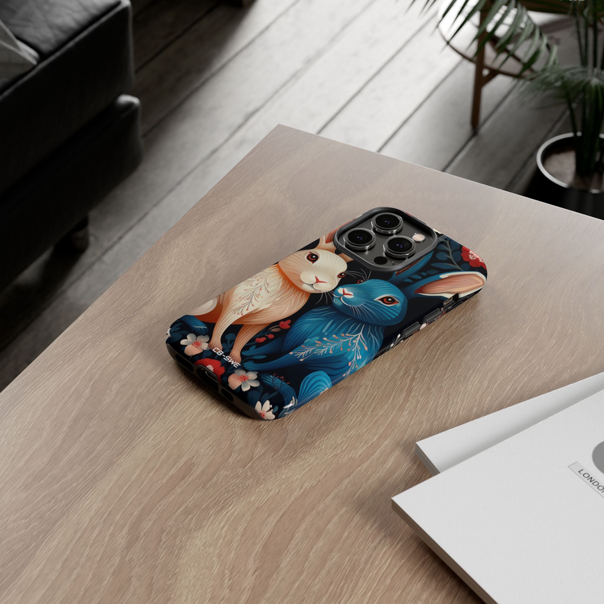 Rabbits Embrace Blossoms - iPhone Case
